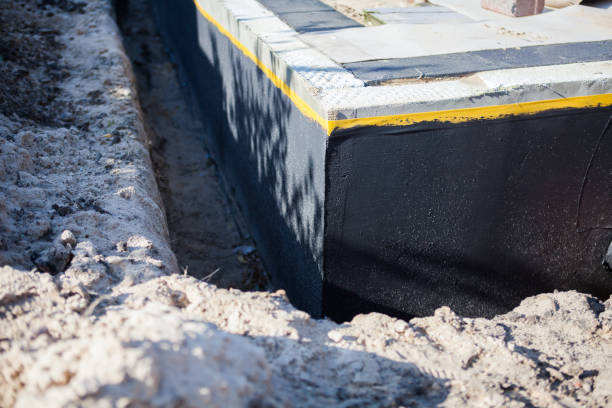 Professional Waterproofing technician working in Lowell, NC